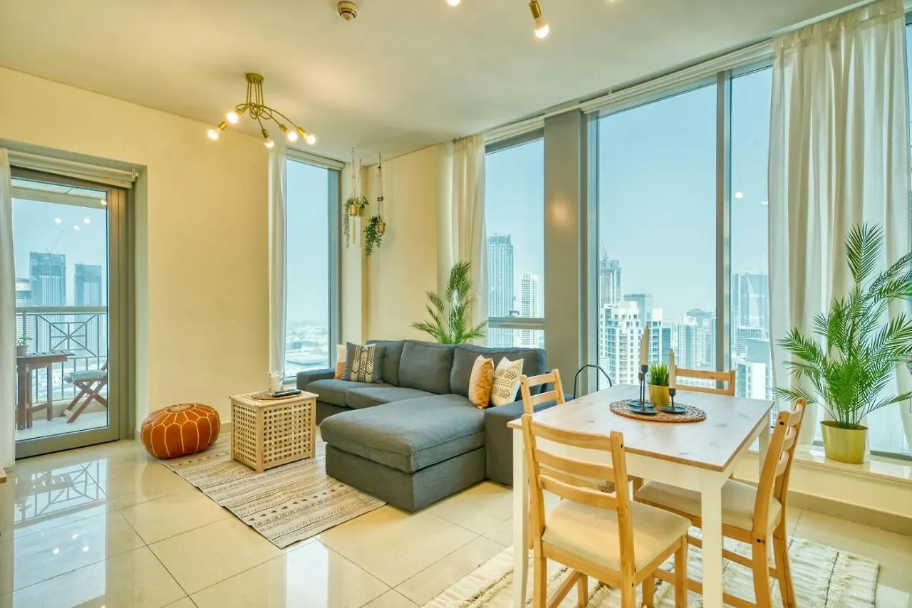 Monty Holiday Home - Cozy Penthouse With Burj Khalifa And Fountain View contacts